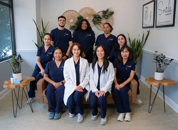 Group photo of Smile Pleasant Hill's dentists and dental hygienists.